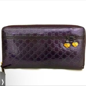 GUCCI MICRO SHIMA GG PATENT LEATHER
ZIPPY AROUND LONG WALLET